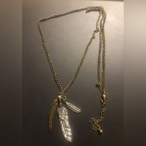 Silver and gold color long necklace with metal feathers